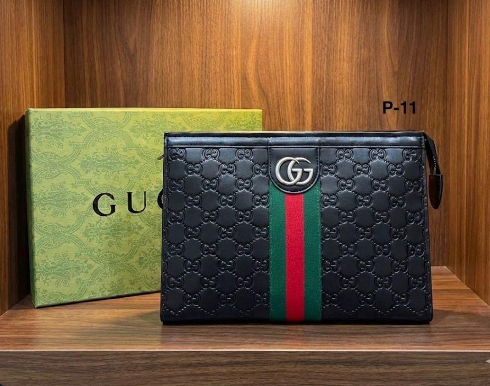 Gucci GG Embossed Leather Bag
